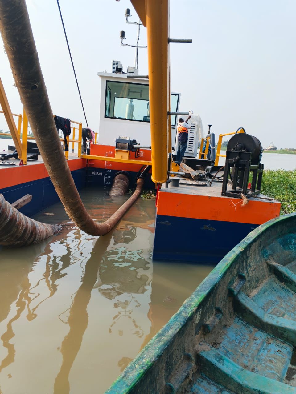 Dredger discharge line in operation