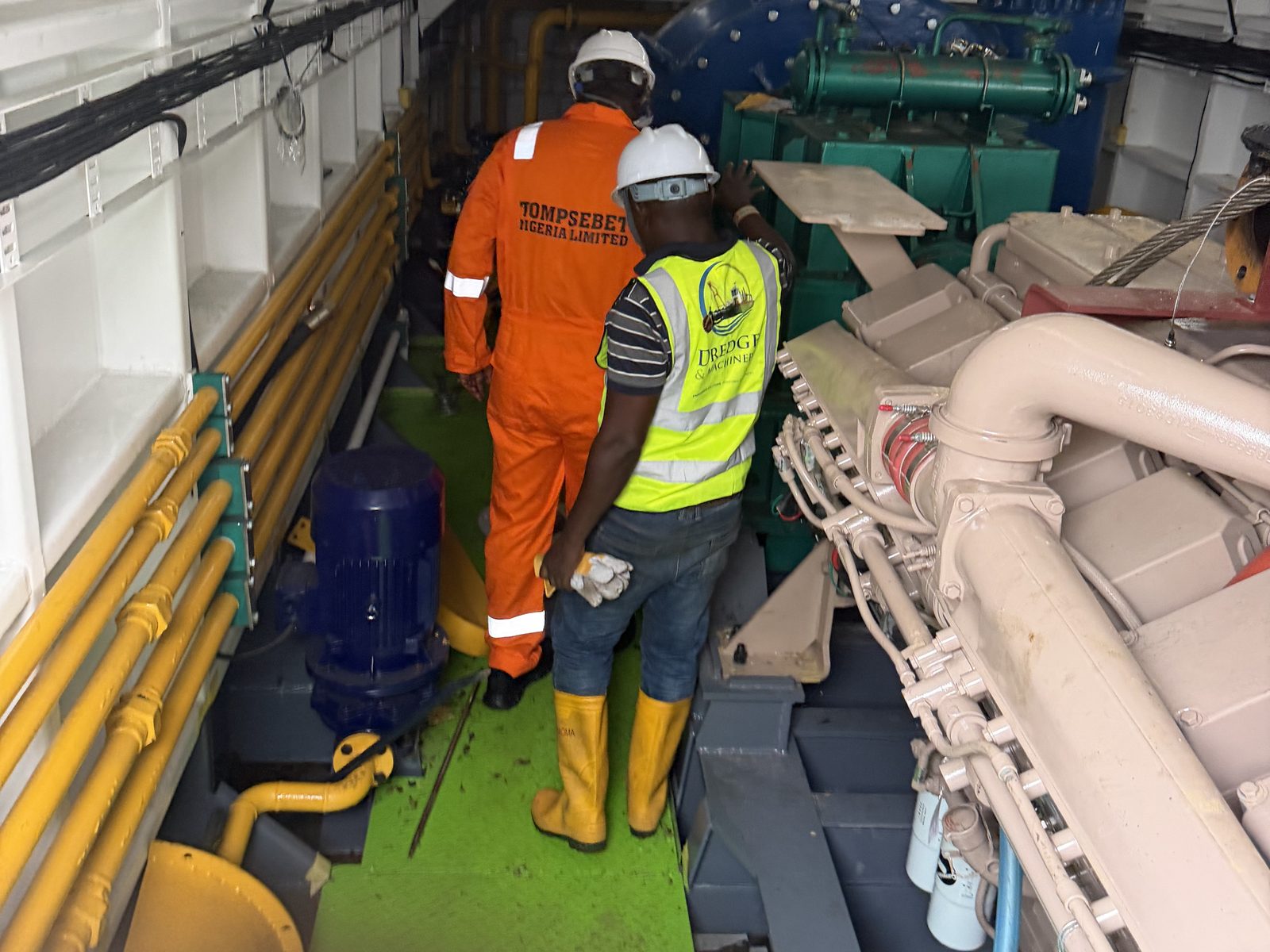Engine room walkway and auxiliary plant aboard the dredger